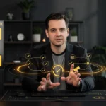 Man in dark jacket gestures toward holographic workflow diagram with checkmarks displayed between two monitors showing yellow